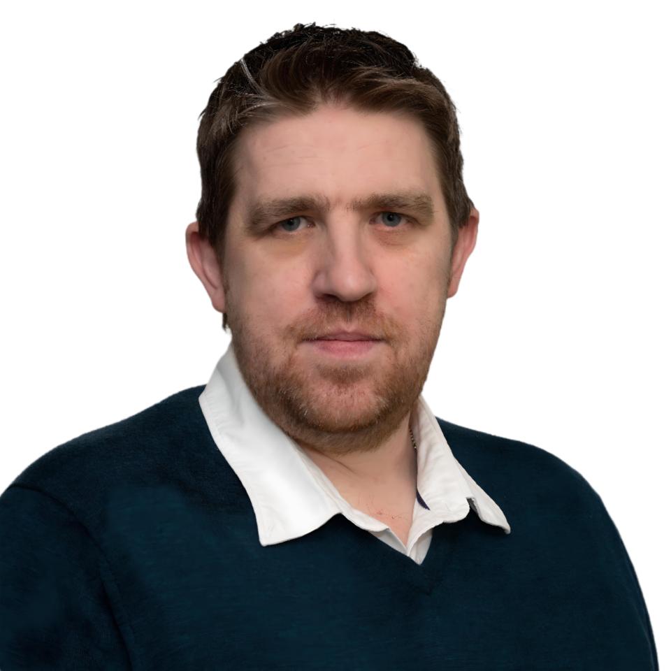 A head and shoulders picture of Damien Foley.
